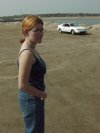 Harmony poses with her car