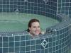 Jill peeks out from the hot tub