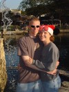 Travis & Patty pose in front of a waterfall on Tom Sawer Island