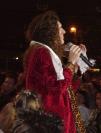He handed out scarves to some of the women