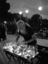 Creepy picture of the old man playing songs with glasses of water