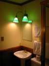 I liked all the decorated brass in the bathroom.