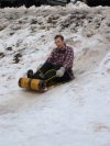 A little 10 year old kid playing in the snow, Oh wait a minuite, thats a 25 year old man playing in the snow.