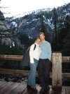 Me and Suz stsnding on a bridge that overlooks a waterfall