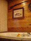 The room even comes equipped with a gun, in case someone breaks into the room and catches you soaking in the tub with your little yellow rubber duckie